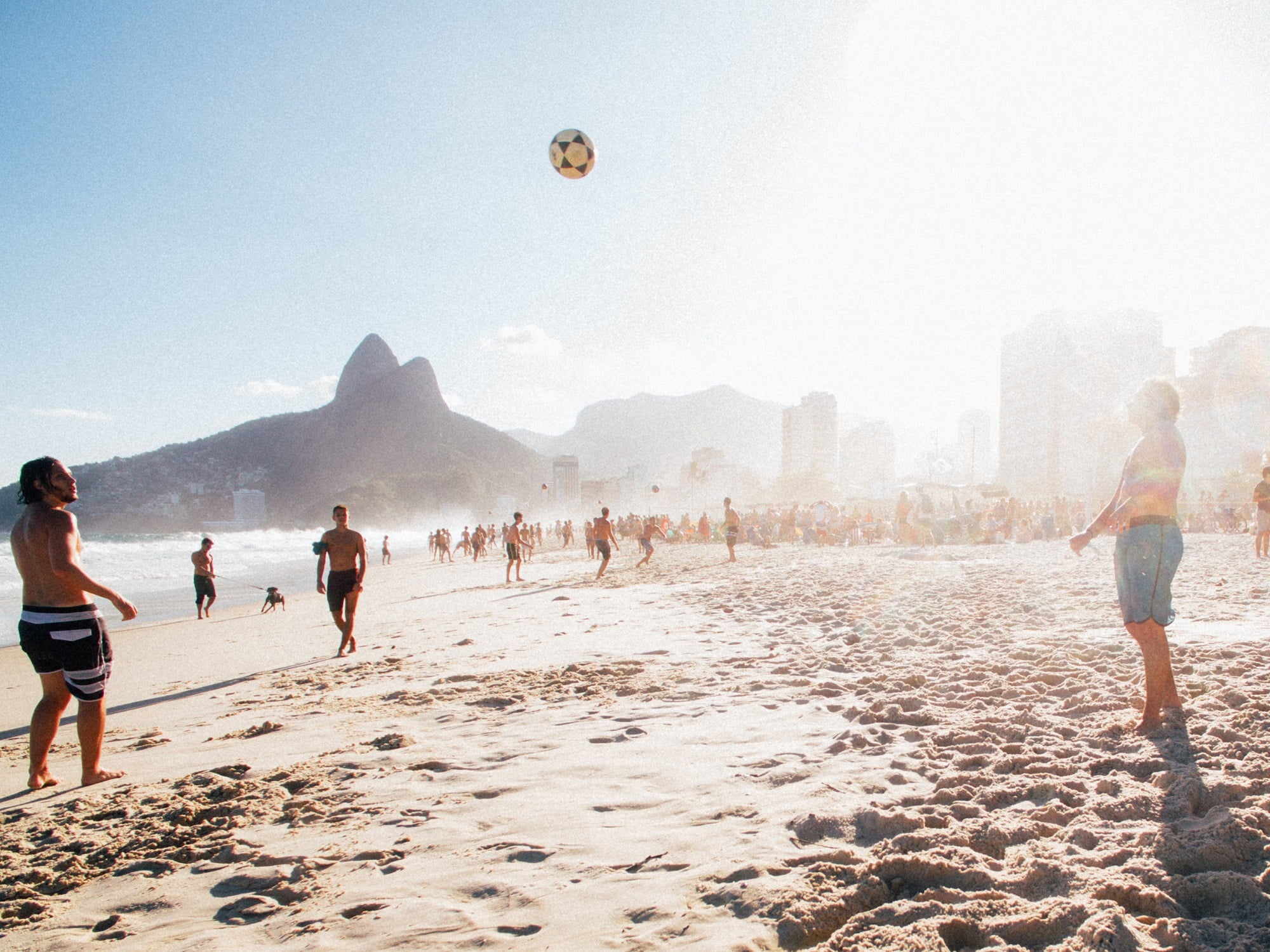 people playing soccer at the beach leblon rio de janeiro brazil homes at beach