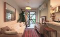 Elegant Linear 2-Bedroom Residence in São Conrado with 1 En-Suite and Mountain Vistas
